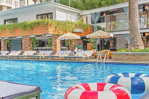 Outdoor pool, pool umbrellas, sun loungers