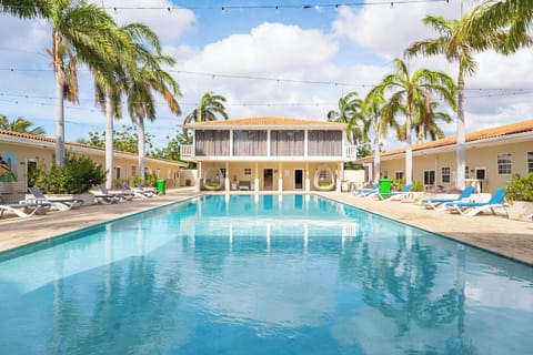 2 outdoor pools, open 7:00 AM to 11:00 PM, free cabanas, pool umbrellas