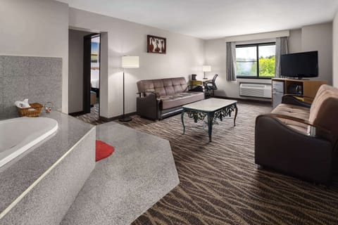 Suite, 1 King Bed, Non Smoking (1 Bedroom) | In-room safe, desk, laptop workspace, iron/ironing board