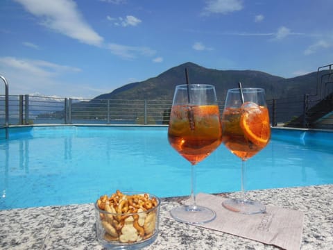 Seasonal outdoor pool, pool umbrellas, sun loungers