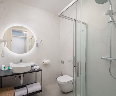 Shower, free toiletries, hair dryer, bathrobes