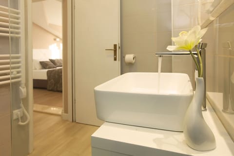 Deluxe Double Room, Balcony, Sea View | Bathroom | Shower, free toiletries, hair dryer, towels