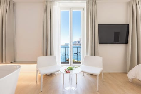 Standard Triple Room, Lake View | Hypo-allergenic bedding, down comforters, minibar, in-room safe