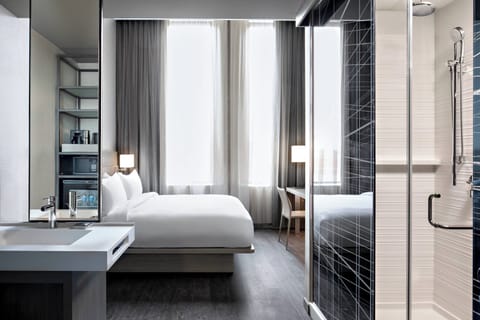 Rainfall showerhead, free toiletries, hair dryer, towels