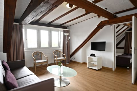 Exclusive Studio Suite, Multiple Bedrooms | Desk, blackout drapes, soundproofing, iron/ironing board