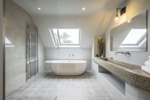 Designer toiletries, hair dryer, bathrobes, slippers