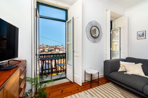 Apartment, 2 Bedrooms, Balcony, City View | Living area | Flat-screen TV
