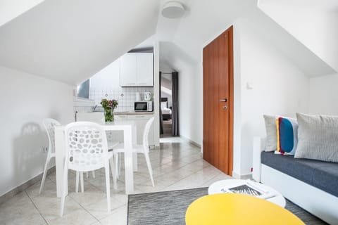 Apartment for 4 people | Living area | 27-inch LCD TV with satellite channels, TV