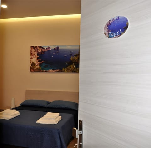 Triple Room | Memory foam beds, in-room safe, individually decorated, desk