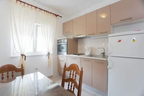 Family Apartment | Private kitchen | Fridge, stovetop, electric kettle, cookware/dishes/utensils