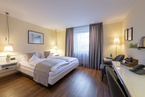 Hypo-allergenic bedding, down comforters, in-room safe