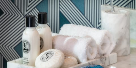 Presidential Suite | Bathroom | Designer toiletries, hair dryer, bathrobes, slippers