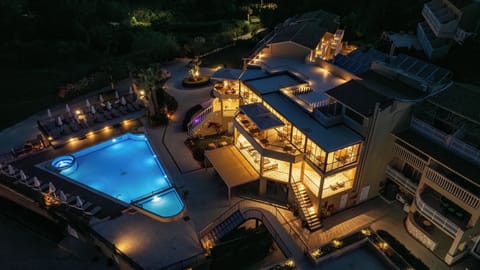 Outdoor pool, open 9:00 AM to 7:00 PM, pool umbrellas, sun loungers
