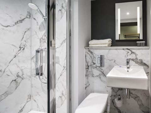 Blackout drapes, soundproofing, travel crib, free WiFi