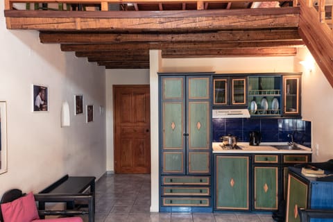 One Bedroom Apartment with Mountain View - Split Level | Private kitchenette | Mini-fridge