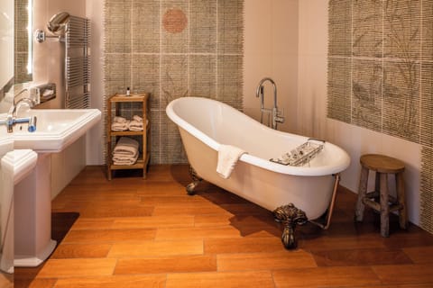 Suite | Bathroom | Hair dryer, bathrobes, towels, soap