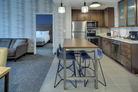 Suite, 1 Bedroom | Private kitchen | Full-size fridge, microwave, stovetop, dishwasher