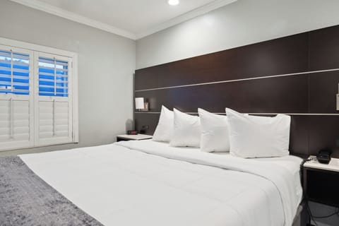 Premium bedding, down comforters, memory foam beds, in-room safe