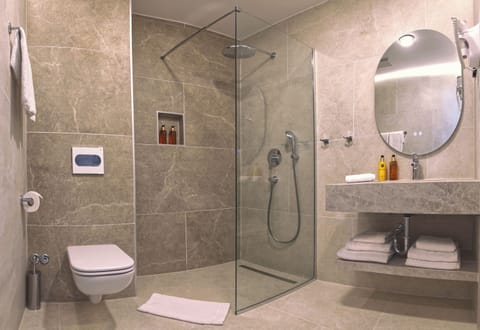 Shower, free toiletries, hair dryer, towels