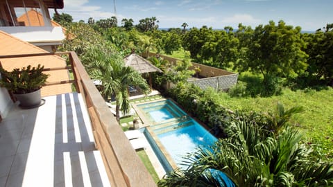 Outdoor pool, open 6:00 AM to 9:30 PM, sun loungers