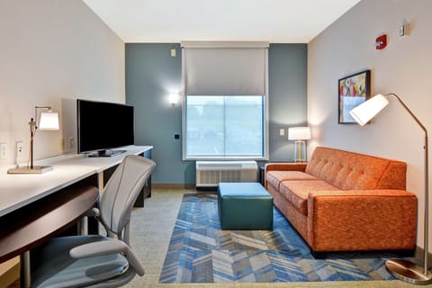 Suite, 1 Bedroom, Non Smoking | Desk, blackout drapes, iron/ironing board, free cribs/infant beds