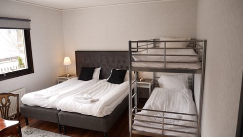 Family Room | 1 bedroom, individually decorated, blackout drapes, free WiFi