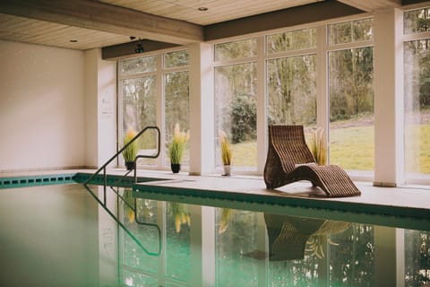 Indoor pool, open 7:00 AM to 9:00 PM, sun loungers