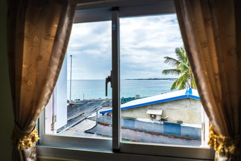 Premium Quadruple Room, 2 Queen Beds, Sea View | Terrace/patio