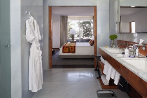 Presidential Suite, 1 King Bed, Balcony | Bathroom | Designer toiletries, hair dryer, towels