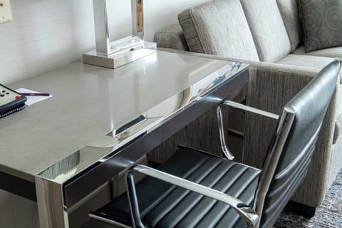 Desk, laptop workspace, blackout drapes, iron/ironing board