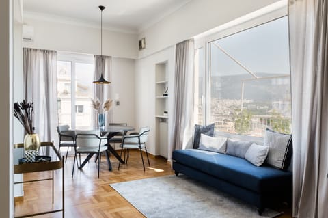 Apartment, 3 Bedrooms | Living room | 43-inch Smart TV with satellite channels, TV, Netflix