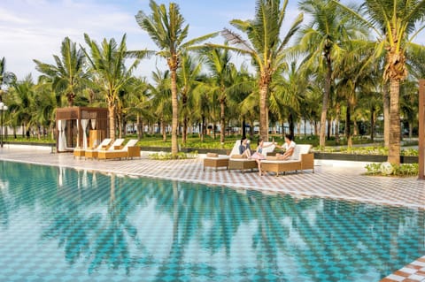 Outdoor pool, pool umbrellas, sun loungers