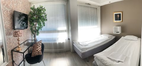 Standard Double or Twin Room | Desk, bed sheets