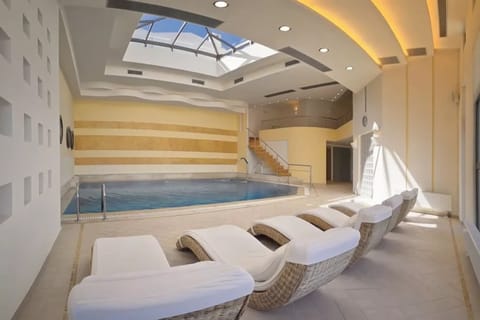 Indoor pool, open 10:30 AM to 9:00 PM, sun loungers