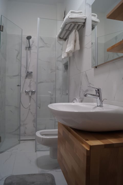 Shower, free toiletries, hair dryer, bathrobes