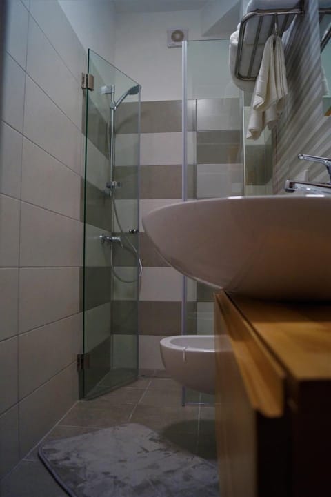 Shower, free toiletries, hair dryer, bathrobes