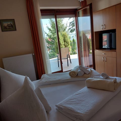 Apartment, 1 Bedroom, Non Smoking, Garden View | Memory foam beds, in-room safe, blackout drapes, iron/ironing board