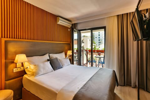 Family Quadruple Room, Multiple Beds, Non Smoking, City View | Minibar, in-room safe, blackout drapes, soundproofing