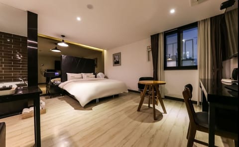 Superior Room | Desk, laptop workspace, blackout drapes, free WiFi