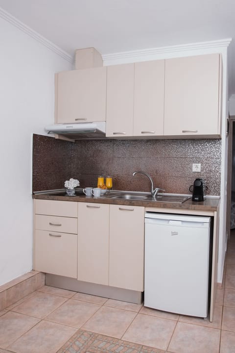 Apartment, 2 Bedrooms | Private kitchenette | Fridge, stovetop, espresso maker, electric kettle