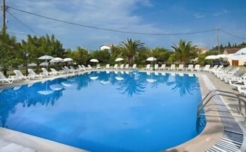 Seasonal outdoor pool, open 9:00 AM to 8:00 PM, sun loungers