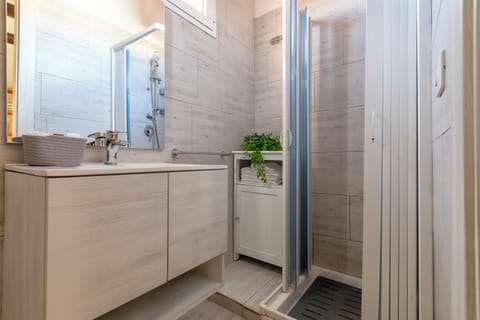 Comfort Quadruple Room, City View | Down comforters, memory foam beds, individually furnished, free WiFi