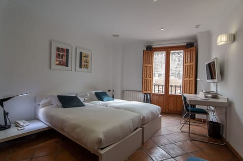 Double Room | Minibar, in-room safe, individually decorated, desk