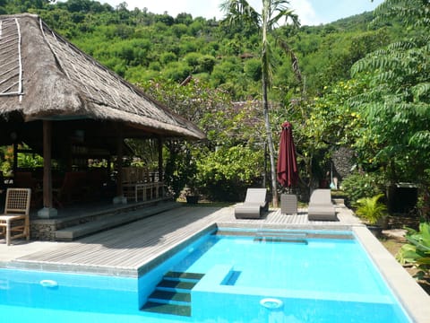 Outdoor pool, pool umbrellas, sun loungers
