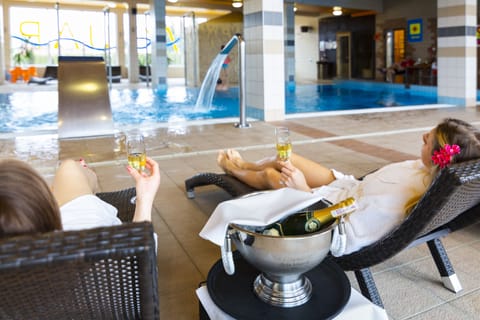 Indoor pool, open 9:00 AM to 9:00 PM, sun loungers