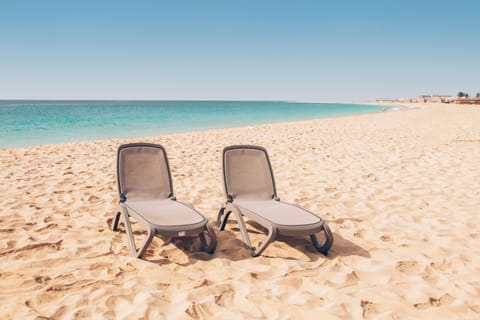 Private beach nearby, white sand, sun loungers, beach umbrellas