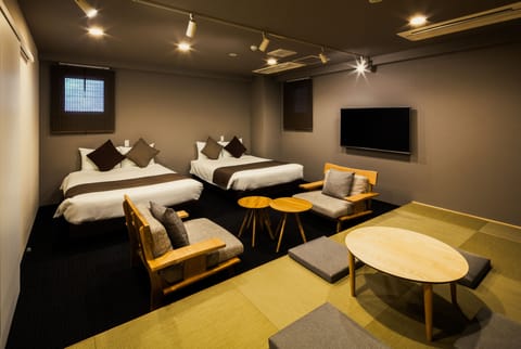 Luxury Suite, Multiple Beds, City View | Living area | Smart TV