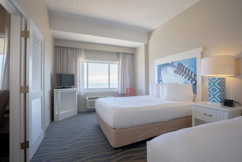 Signature Suite | Premium bedding, in-room safe, desk, iron/ironing board