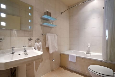Combined shower/tub, eco-friendly toiletries, hair dryer, towels