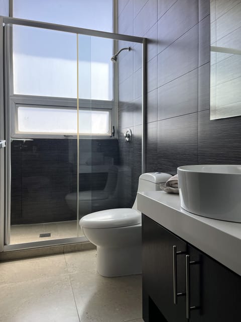 Basic Quadruple Room, 2 Double Beds, Non Smoking | Bathroom | Shower, rainfall showerhead, free toiletries, hair dryer